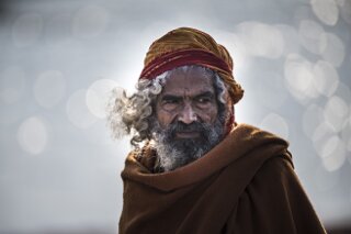 Pilger bei der Kumbh Mela, Indien